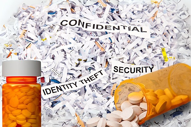 shredded documents with medicine bottles warning of ID theft