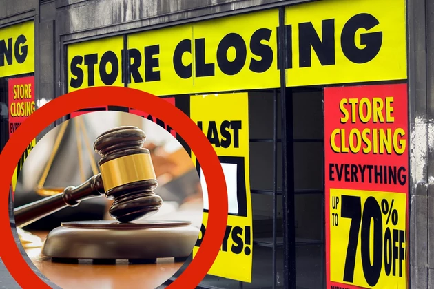 Store closing signs with a smaller picture of a court gavel. 