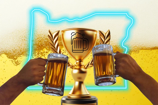 beer background, neon oregon state outline, two fists holding glasses of beer. Trophy in the middle