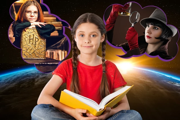 Girl holding a book. Thinking about her self as Harry Potter and a detective. Space background